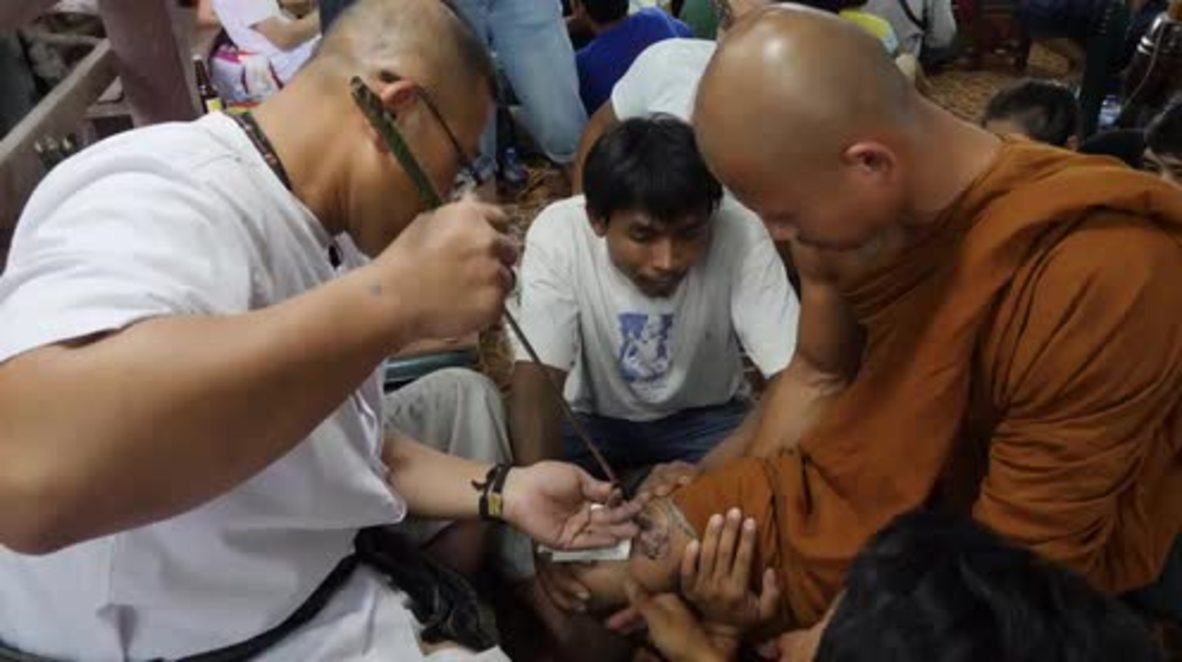 Thailand: Charmed! Monks get their tattoos recharged at Wai Kru festival