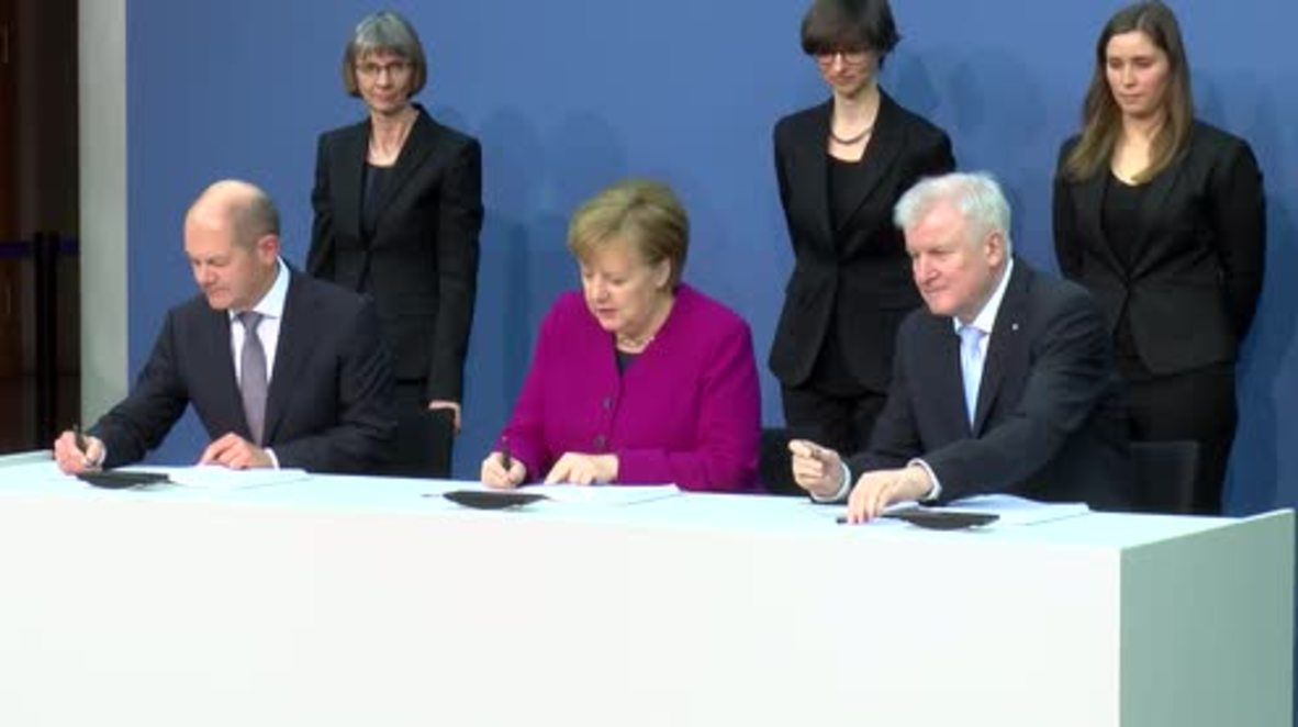 Germany: Merkel, Seehofer and Scholz sign Grand Coalition agreement
