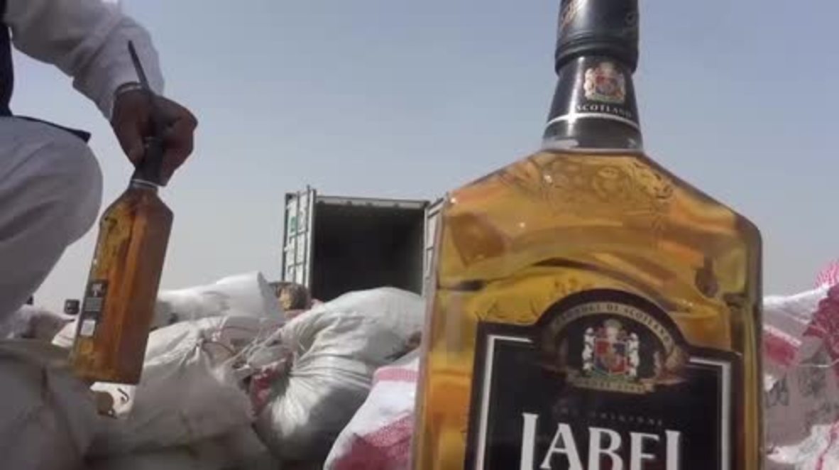 Afghanistan: Kandahar police burn huge 26-ton drug and bomb haul
