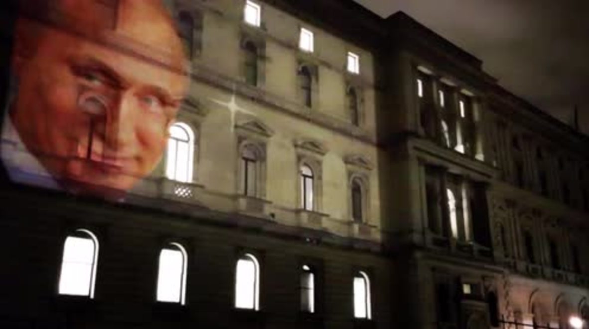 CORRECTION: British Foreign Office deny Putin's portrait projected onto building