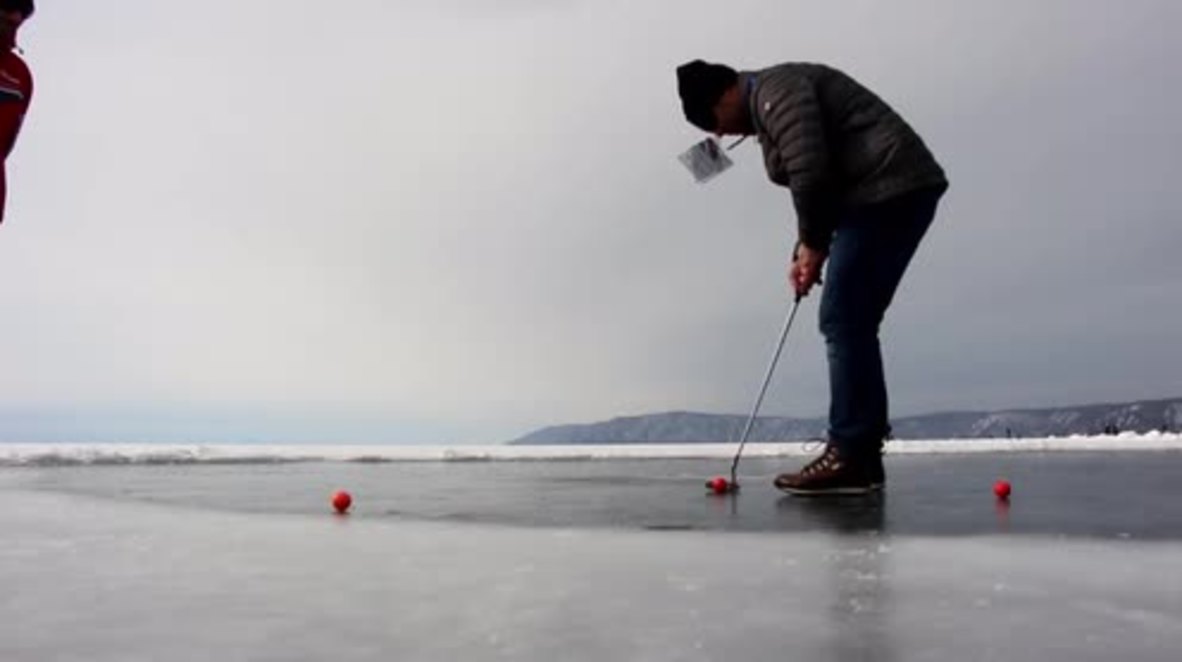 Russia: Golfing on ice! Golfers combine their love of ice and golf at Baikal lake
