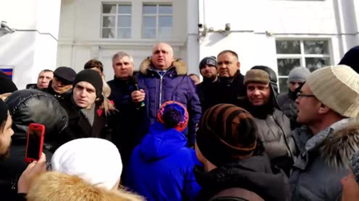 Russia: Kemerovo official begs on his knees for forgiveness before angry crowd