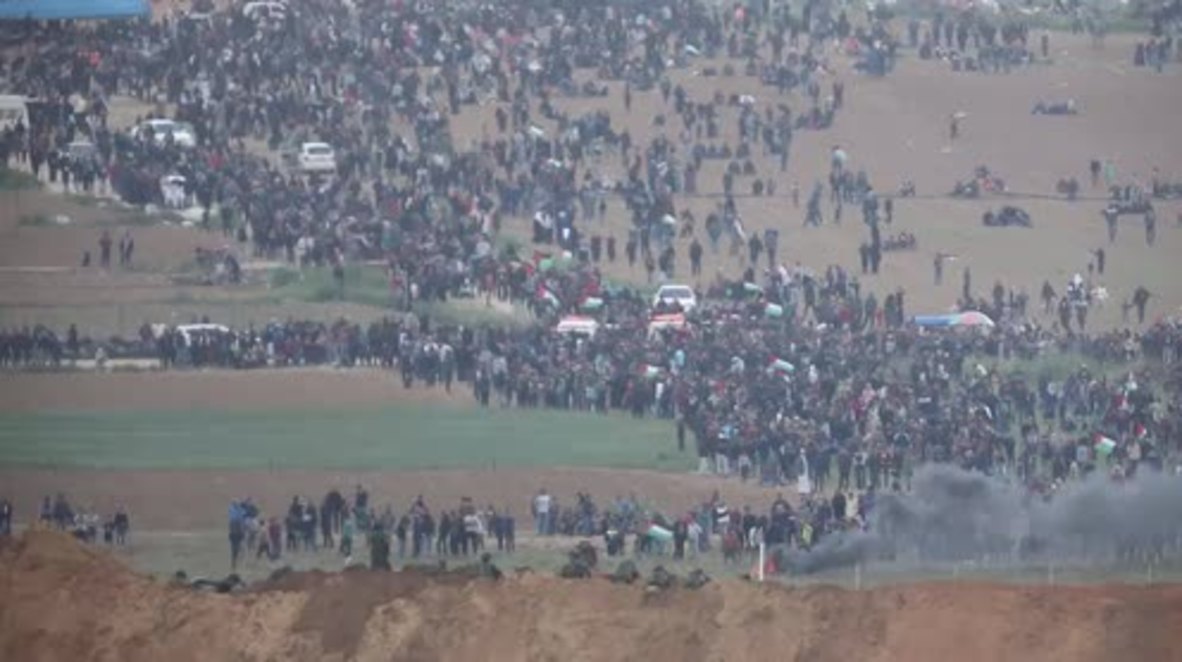 Israel: Israeli soldiers face off with thousands of Palestinians on Gaza border