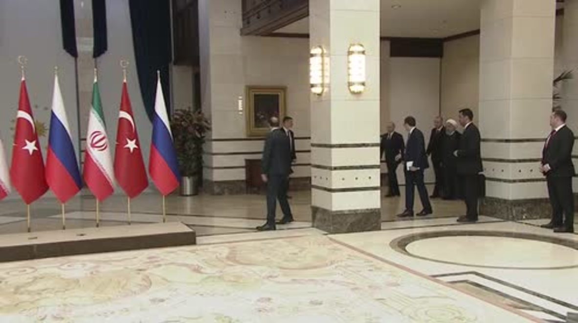 Turkey: Putin, Erdogan and Rouhani pose for photos ahead of trilateral talks