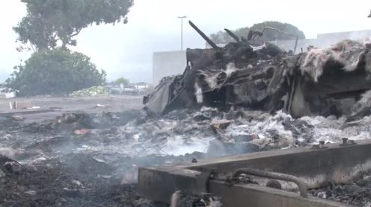 South Africa: Fire and destruction as police intervene in settlement clashes