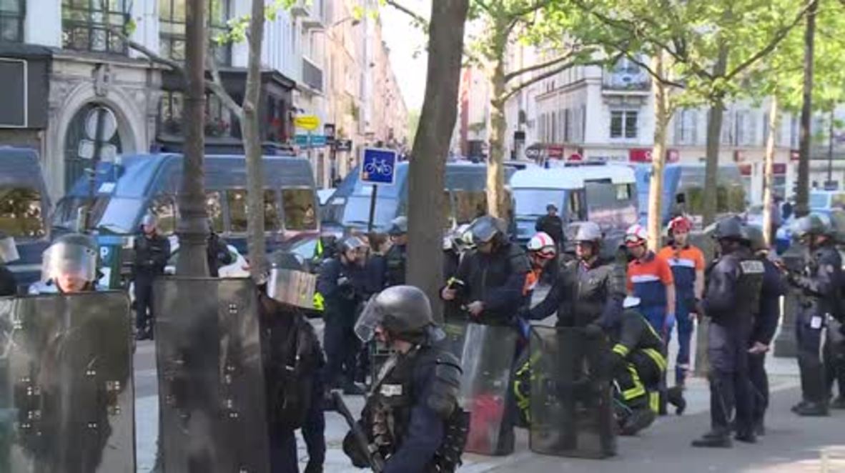 France: Police officer injured during anti-Macron rallies in Paris