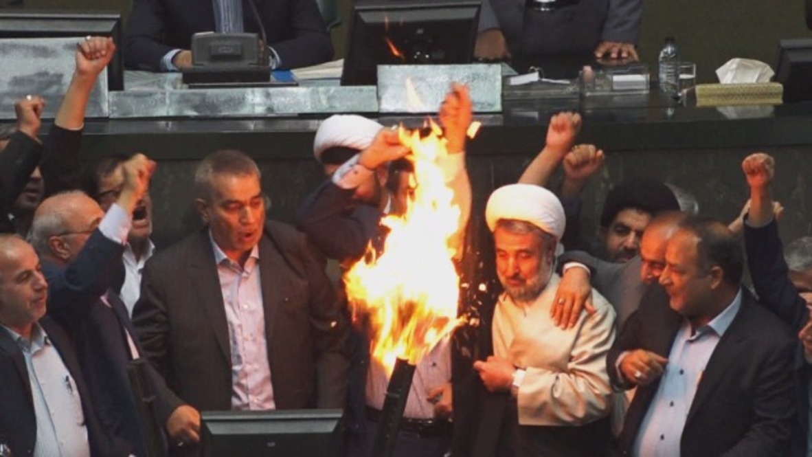 Iran: US flag up in flames inside Iranian parliament after Trump nixes nuclear deal