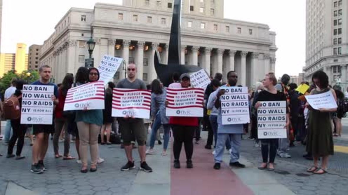USA: Protesters gather outside ICE HQ to support immigrant communities