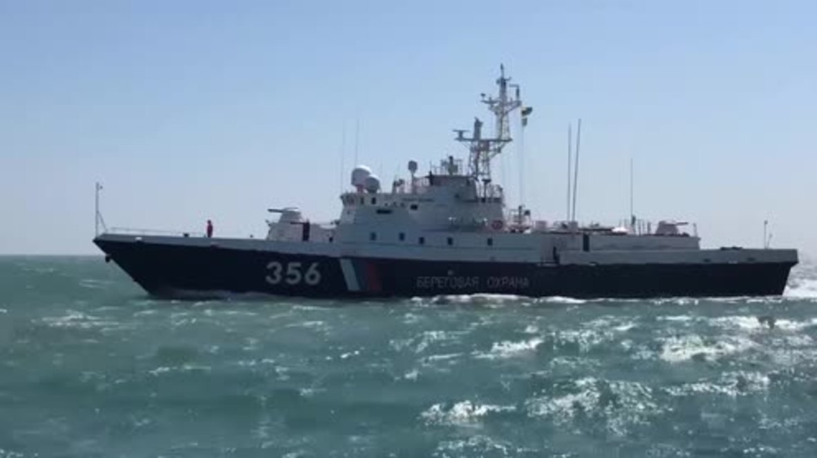Russia: Crimean citizens witness ships set to guard Crimean Bridge