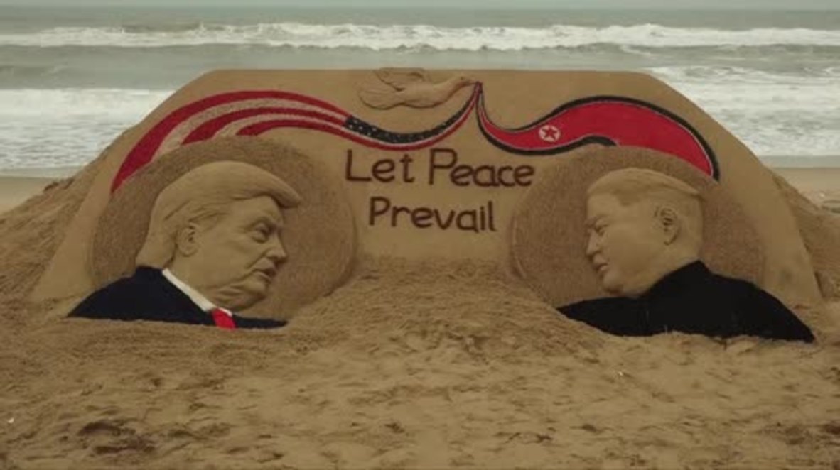 Trump, Kim sand sculpture celebrates peace ahead of summit
