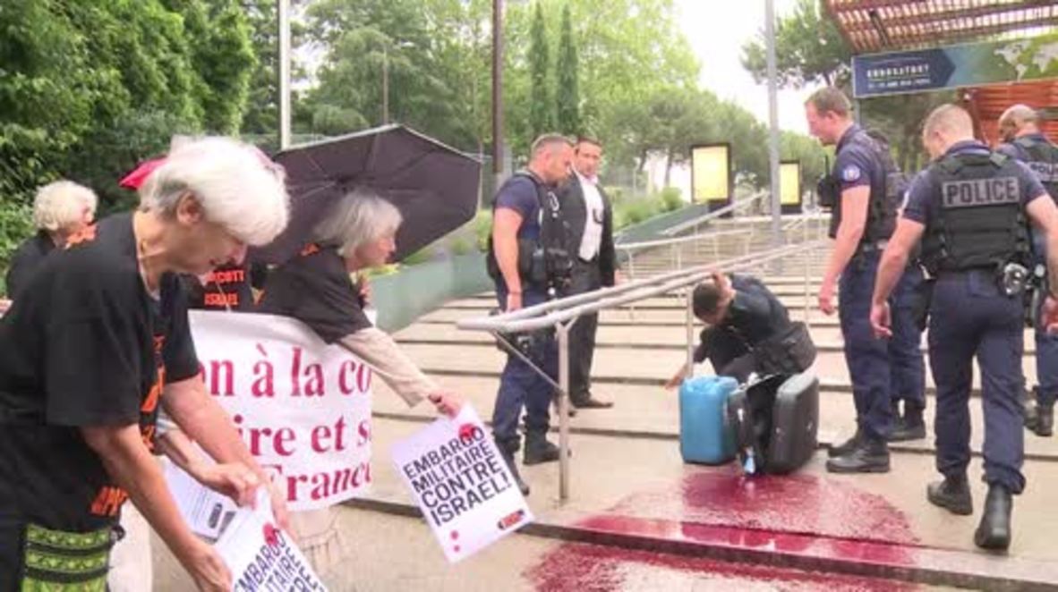 France: Peace activists stage die-in outside Paris arms show