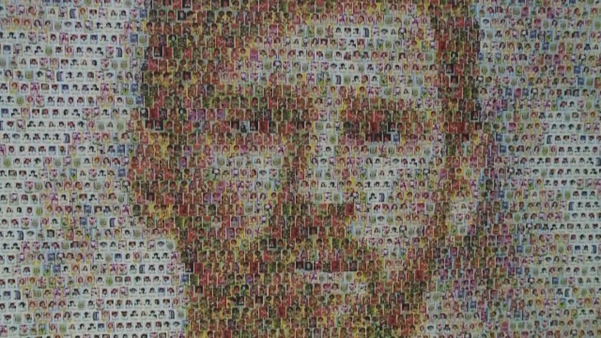 Mind-blowing Messi mural made from shedload of soccer stickers!