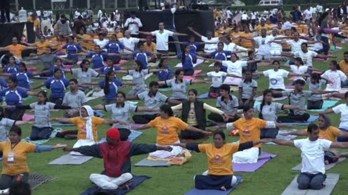 India: 65,000 yogis set new Guinness World Record on Int'l Yoga Day