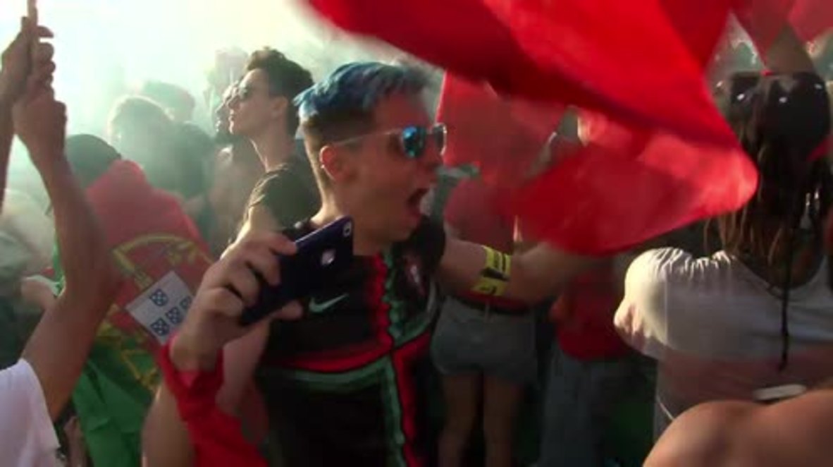 Portugal: Lisbon fans jump with joy as Portugal draws with Iran