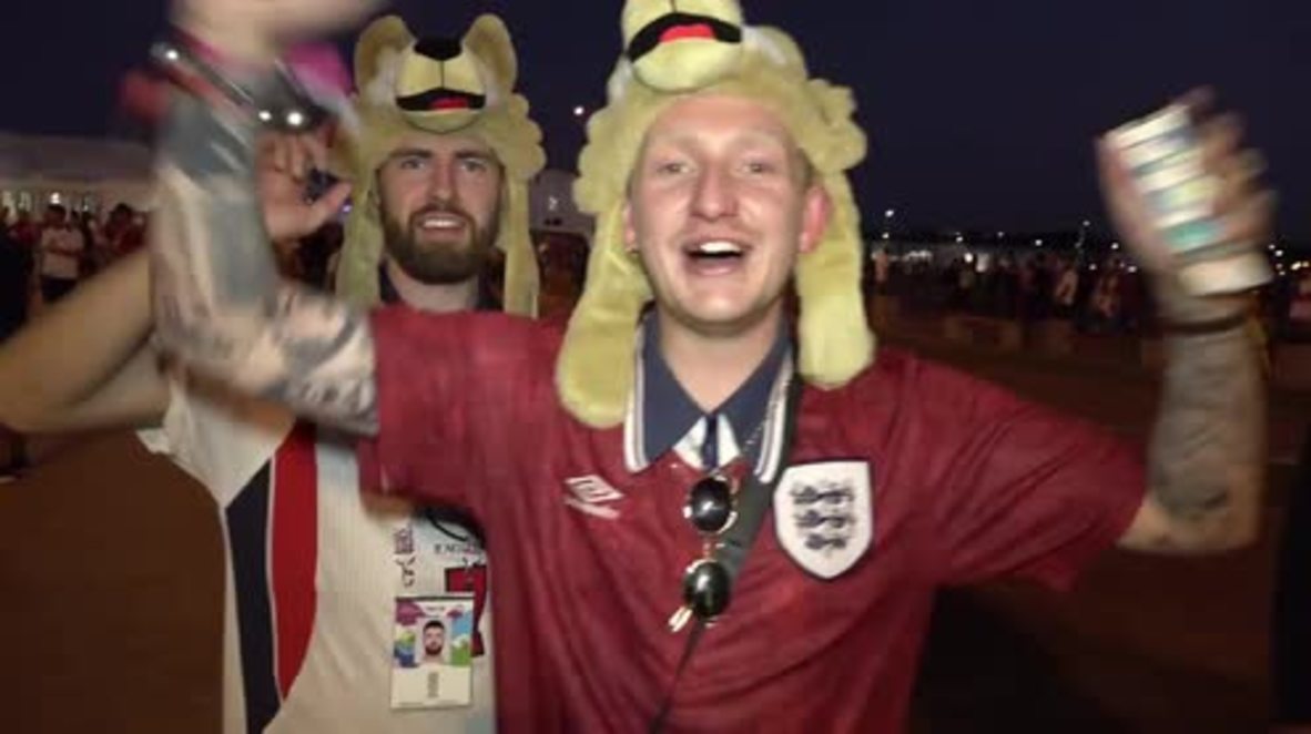 Russia: Belgian and English fans celebrate their advance to knockout stages