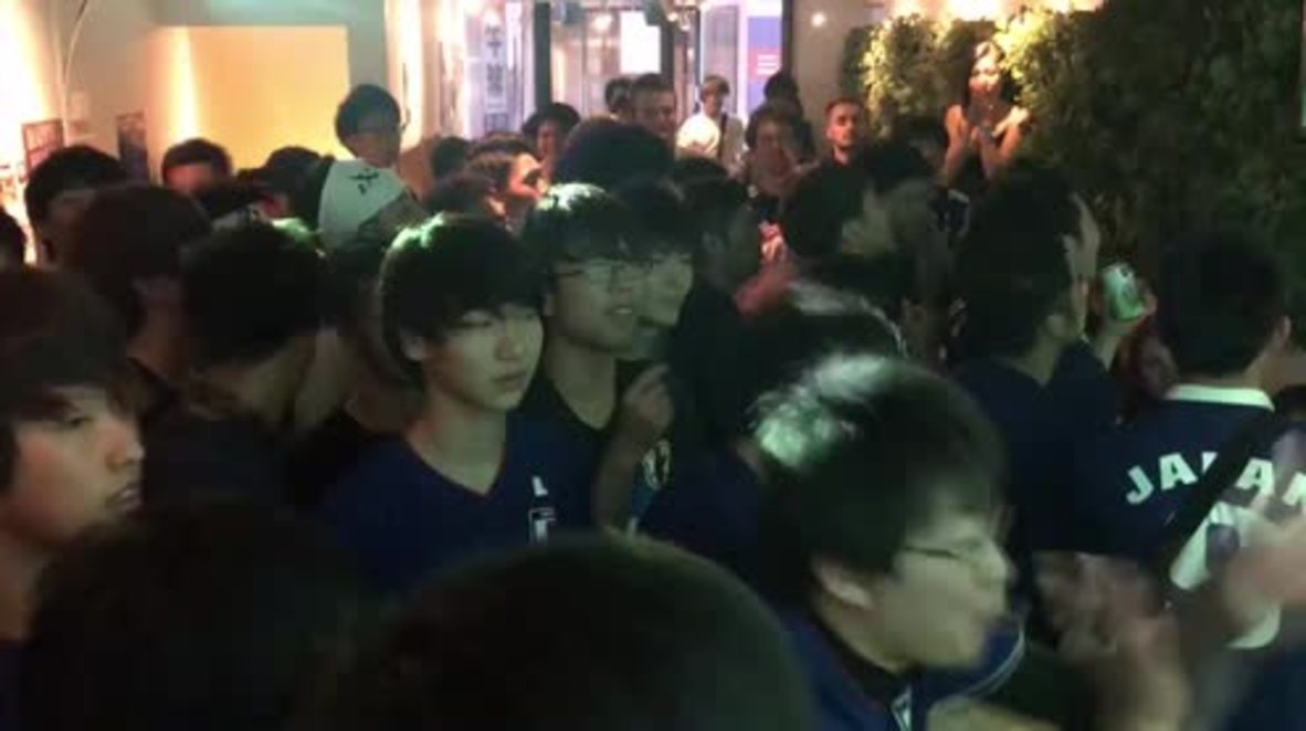 Japan: Going nuts for Nippon! Tokyo fans go beserk as Japan score