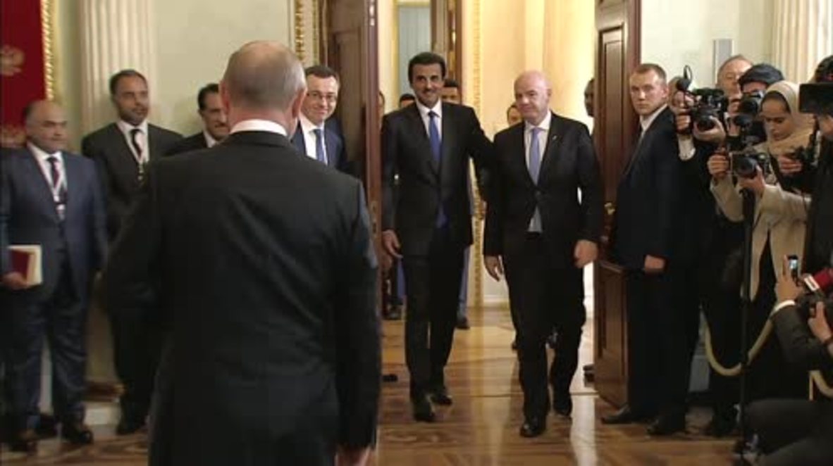 Russia: Putin hands World Cup host mantle to Qatari Emir