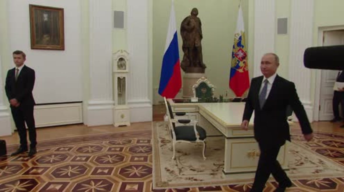 Russia: Putin meets IOC President Bach in Moscow