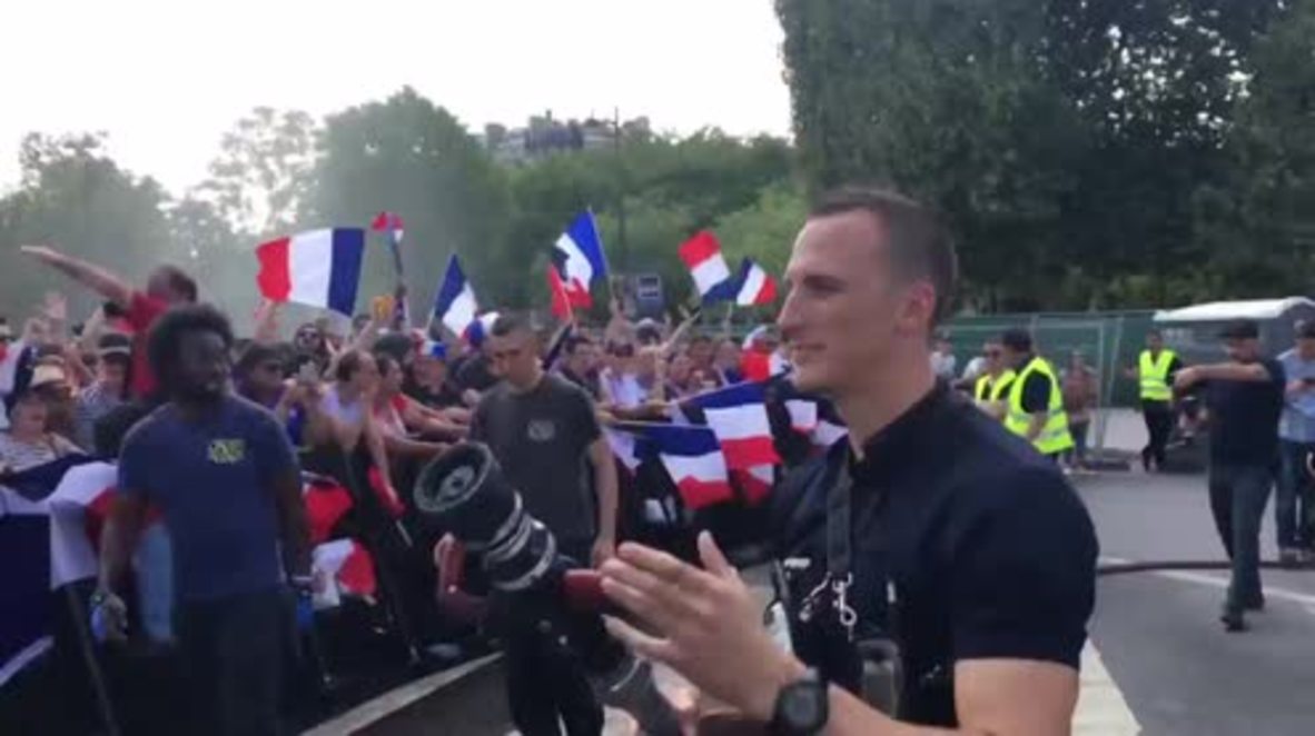 French firefighters HOSE OFF football flames in Paris