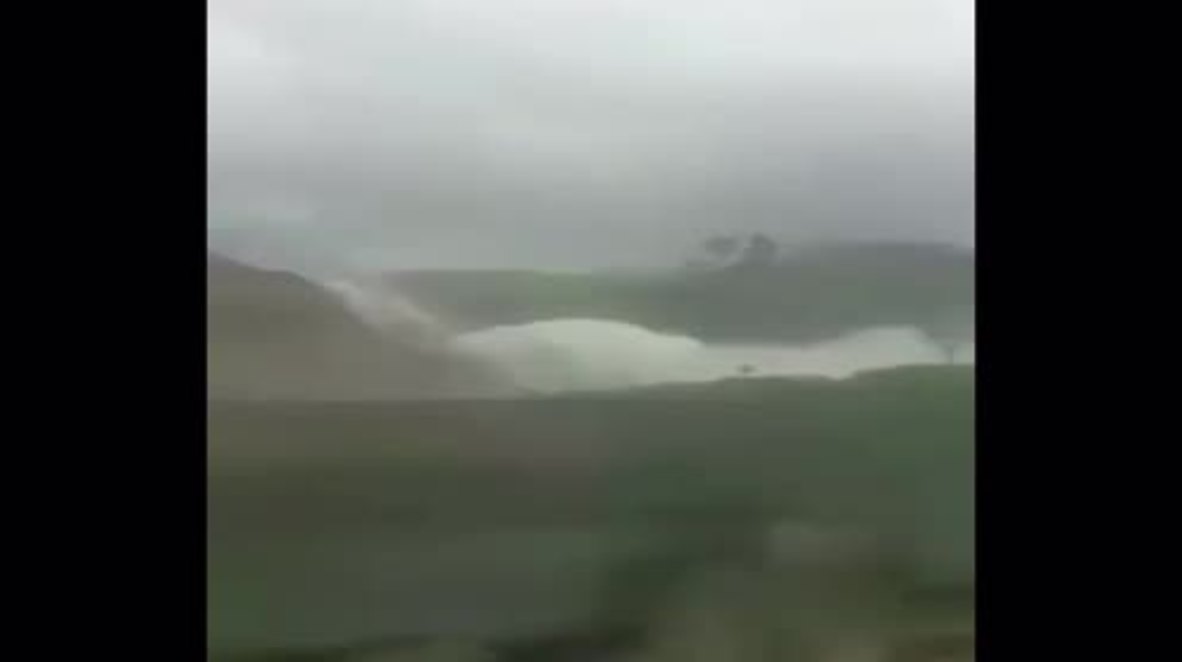 Laos: Hundreds feared dead as dam collapse floods six villages