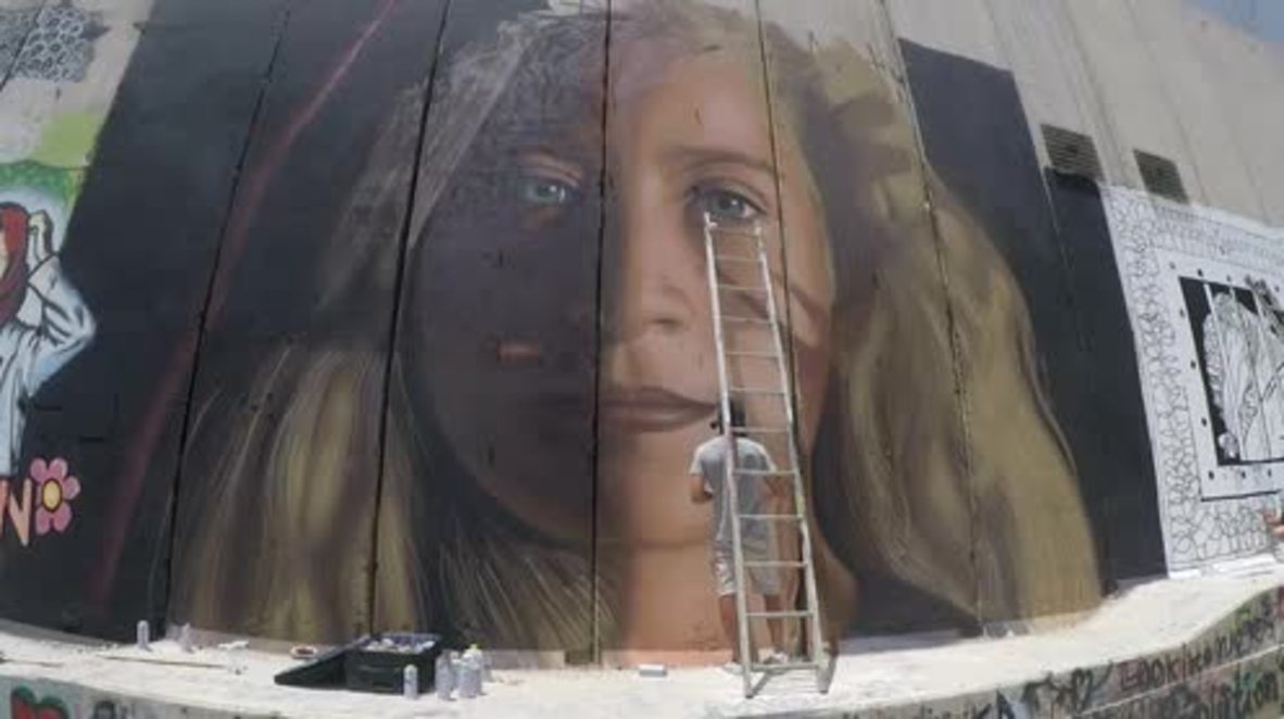 State of Palestine: Giant portrait of jailed Palestinian teen Ahed Tamimi appears in Bethlehem