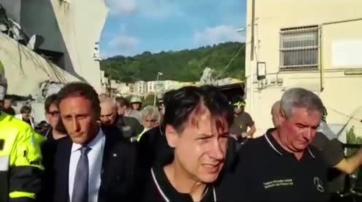 Italy: PM Conte visits rescue teams at collapsed Genoa motorway site