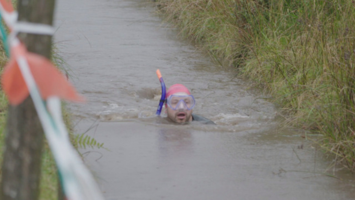 Bog snorkelers get down and dirty for mucky world glory