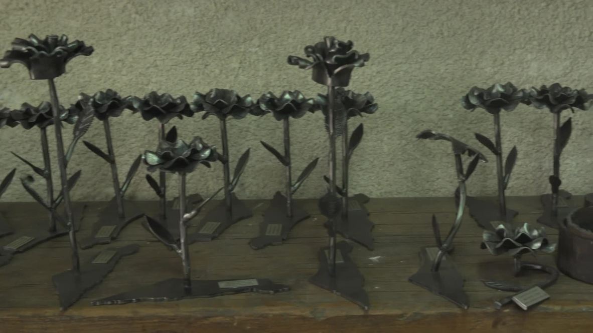 Bombs and roses: Israeli artist turns rocket scrap into floral sculptures