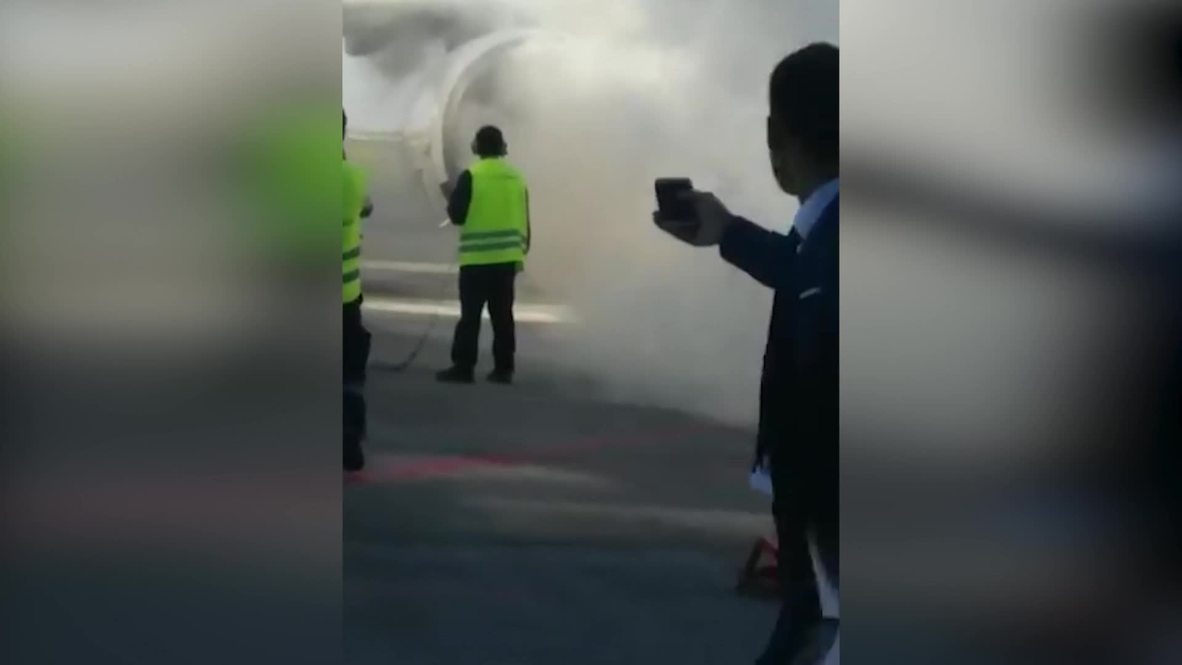 Kazakhstan: Plane spews smoke after landing in Astana