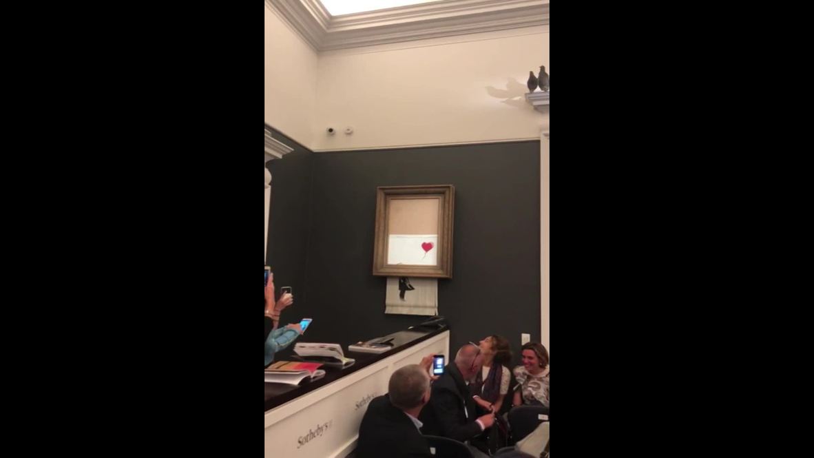 Exit through the shredder - Banksy work self-destructs after £1m sale