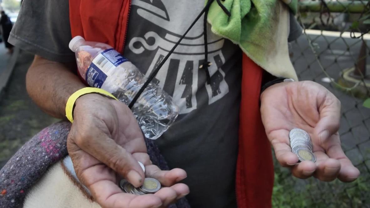 Mexico: Barbers and beggars - migrants try to secure money to resume journey to US border