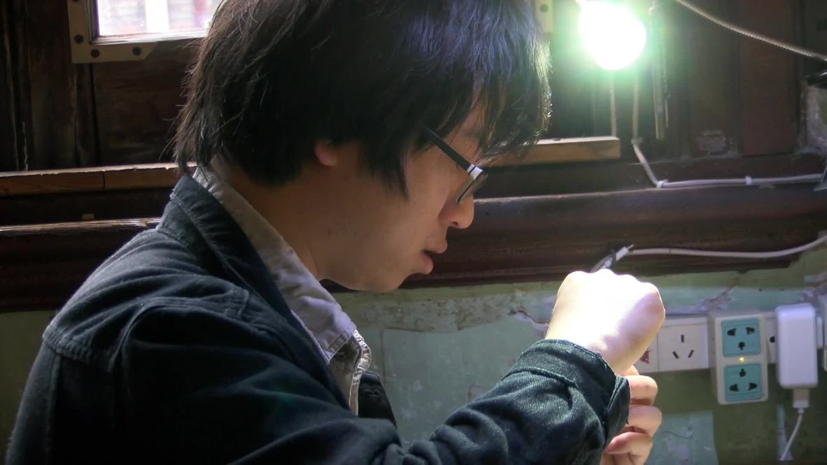 Shanghai artist transforms bugs into steampunk art