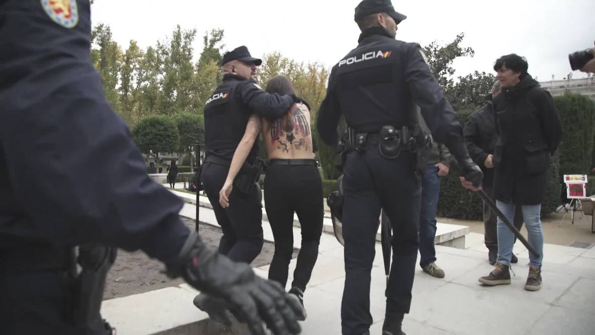Spain: Topless FEMEN activists crash Franco rally *GRAPHIC*