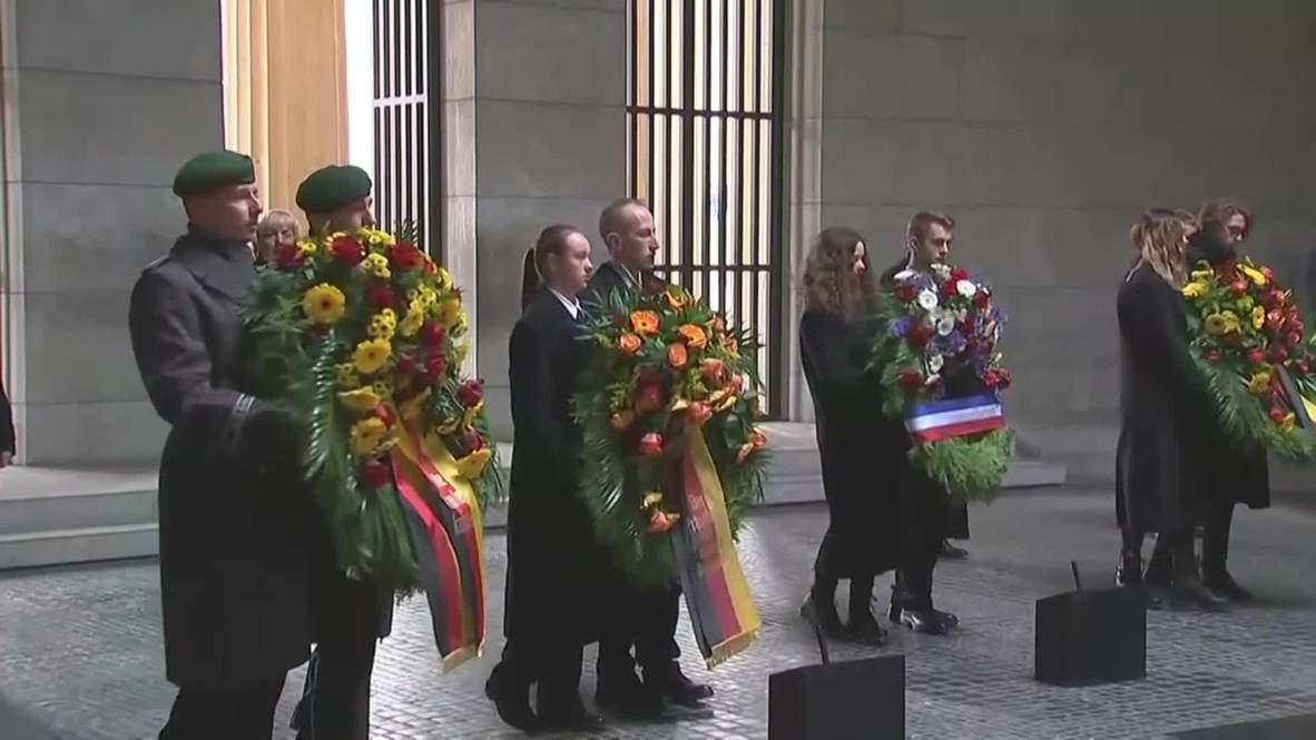 Germany: Merkel, Macron, Steinmeier lay wreaths at Berlin memorial