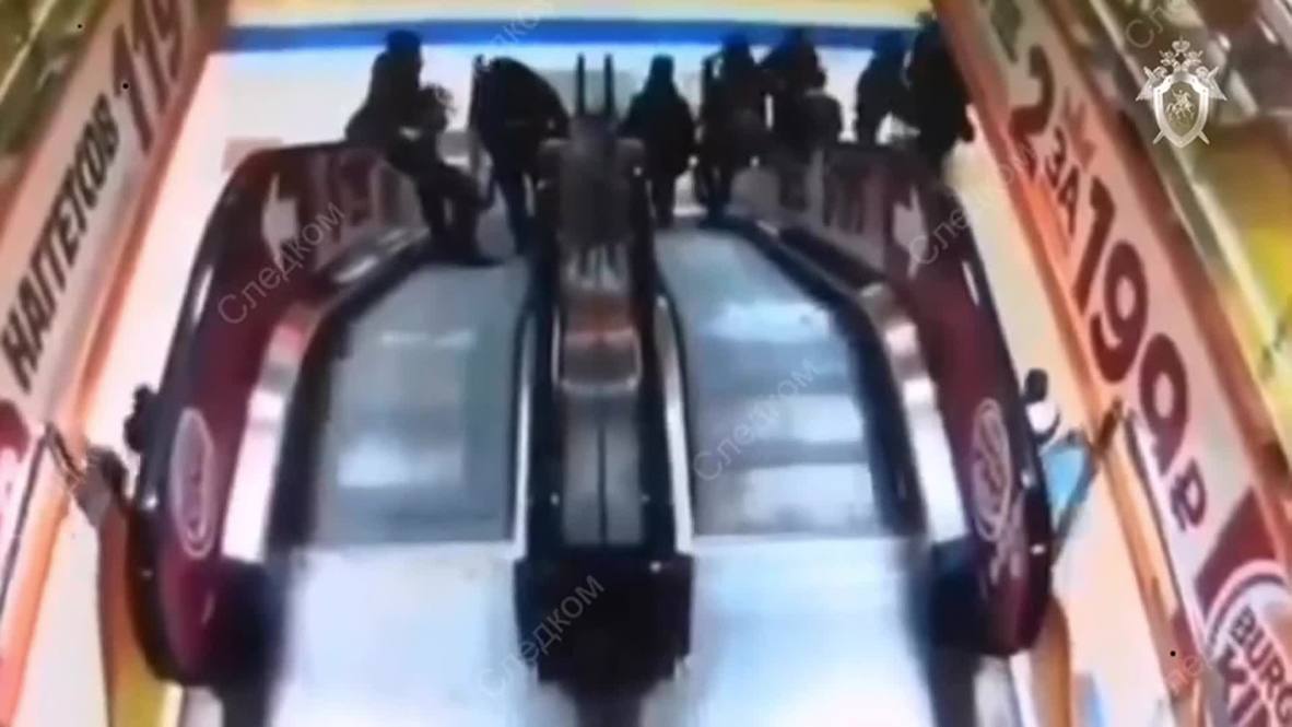 Russia: CCTV captures moment boy sends little brother down an escalator in shopping cart