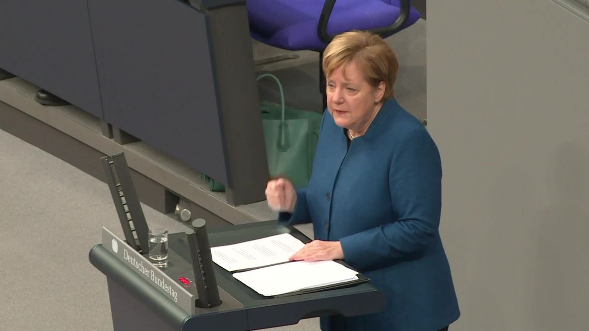 Germany: Merkel defends UN migration pact, agrees with Brexit deal