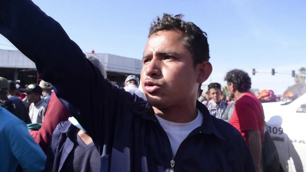 Mexico: Caravan migrants escorted back to shelters after rushing US border