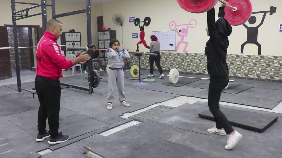 Weightlifting champ camp in Jordan gives young refugee girls a boost