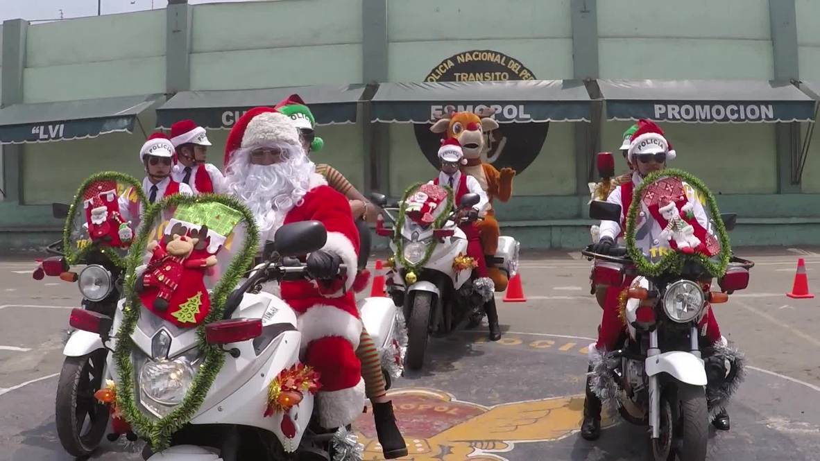 Christmassy cops cruise through Lima to reinforce rules of the road