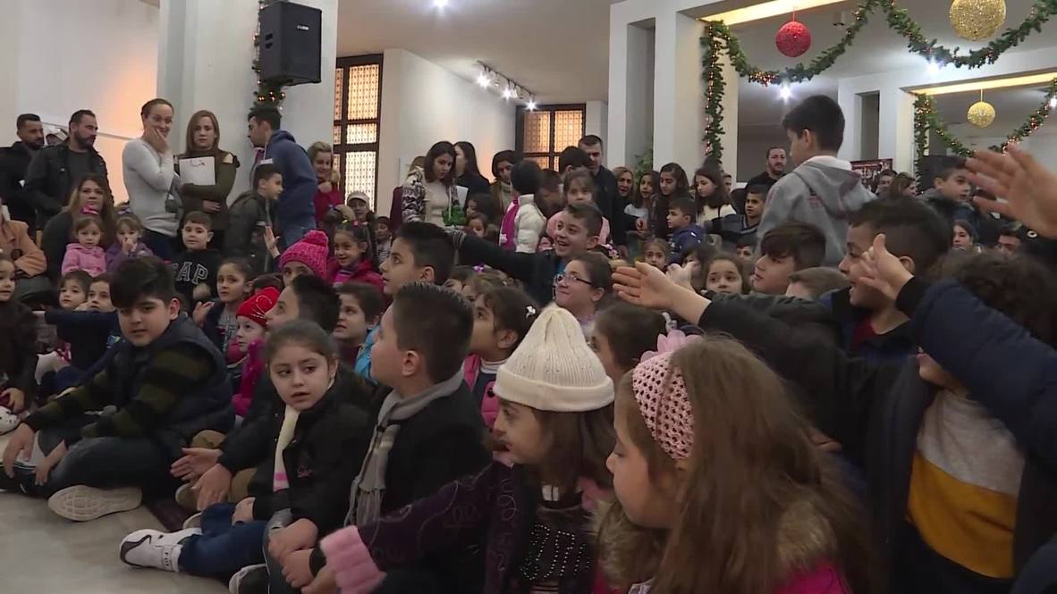 Lebanon: Iraqi refugees gifted presents for Epiphany