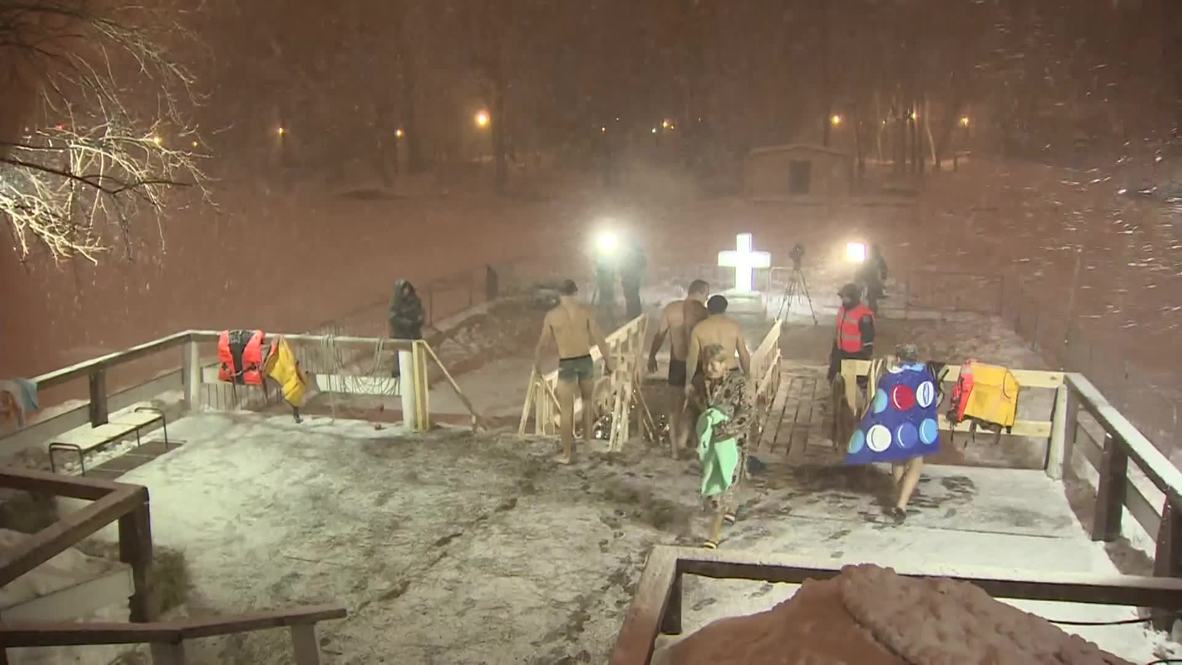 Russia: Orthodox Christians submerge into icy water for Epiphany