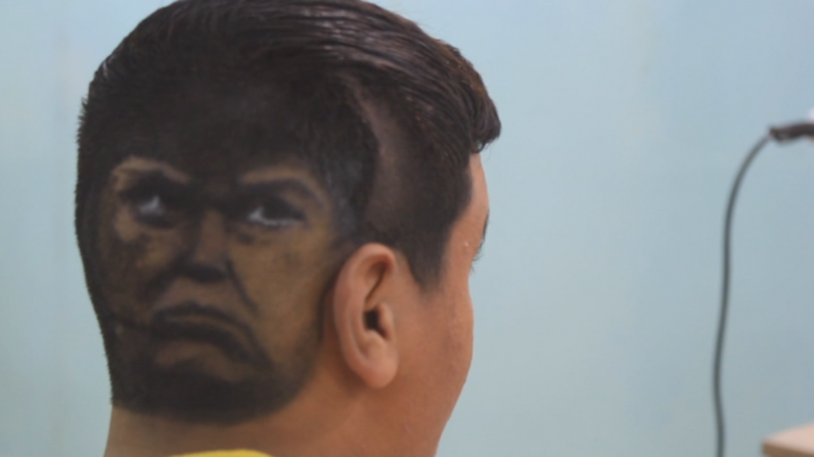 This Benghazi barber's skills will make your hair great again