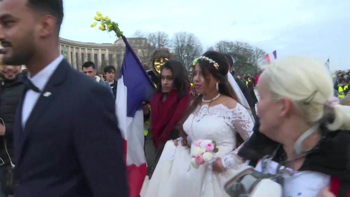 Yellow vests, white dress! Paris newlyweds parade their love on frontline