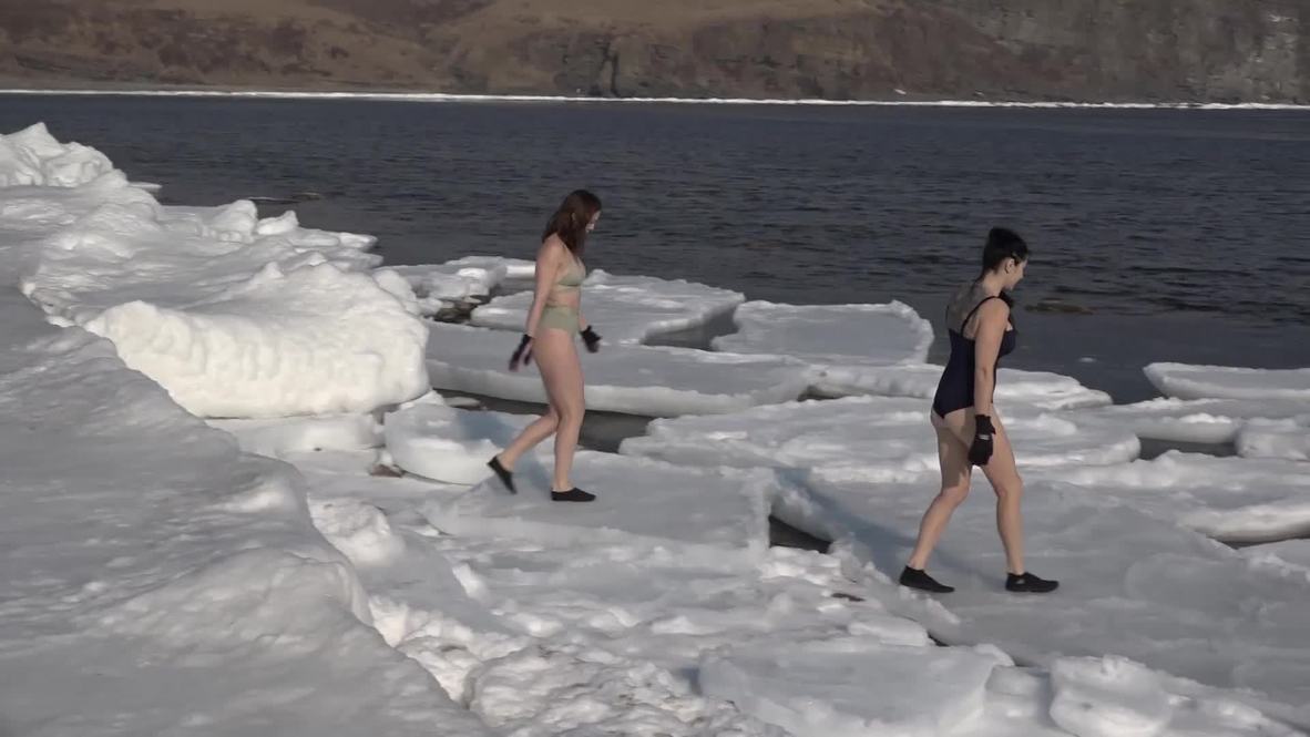 Fearless female swimmers plunge into freezing sea at Vladivostok