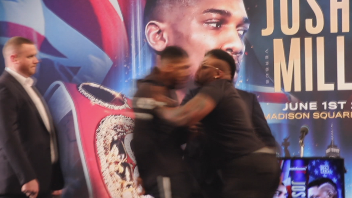 USA: Jarrell Miller shoves Anthony Joshua at title fight presser