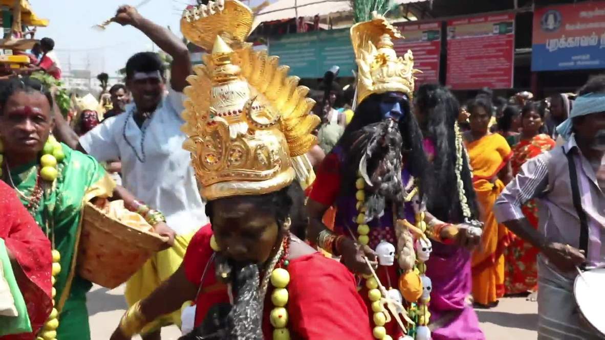What the cluck?! Indian worshippers wolf down LIVE chickens at Graveyard Festival *GRAPHIC*