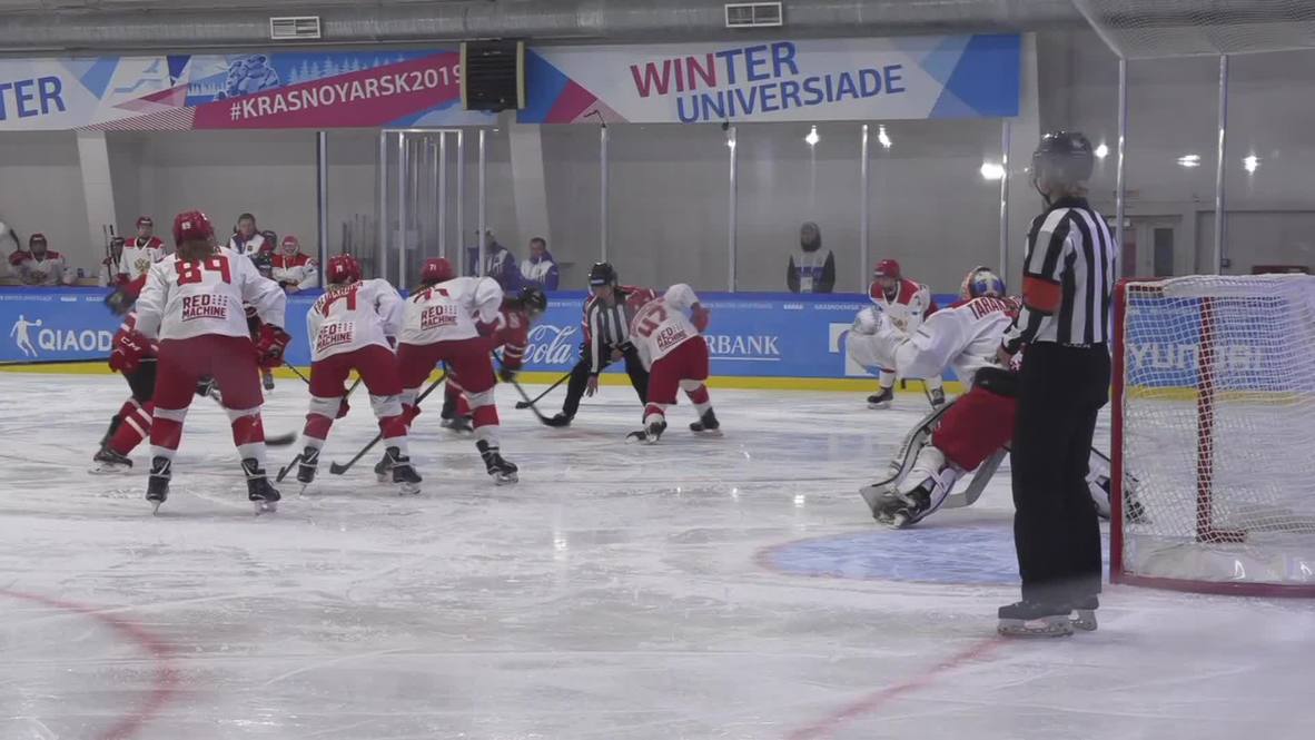 Russia: Relatives and fans cheer on their teams at Canada-Russia hockey clash