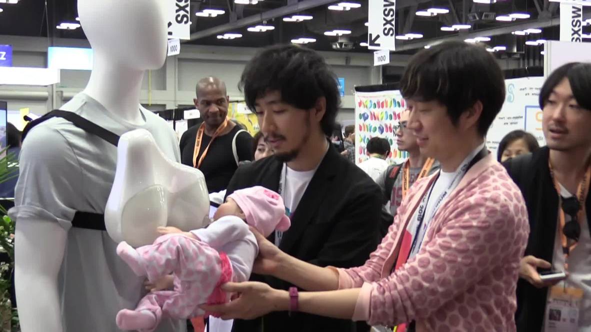 USA: 'Daddy gets a boob job' with breastfeeding device for fathers at SXSW
