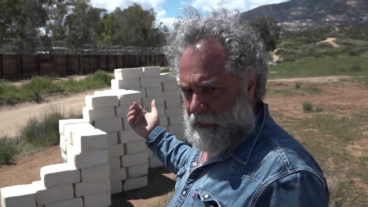 Artist builds CHEESE wall on Mexican border to 'Make America Grate Again'