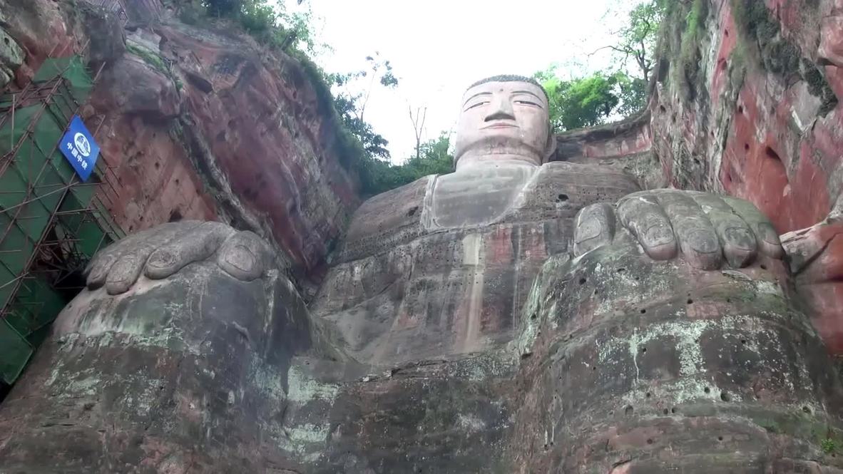 World's largest stone Buddha welcomes back visitors after six-month restoration